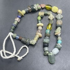 Collana filo perline forma