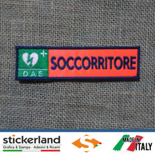 Toppa Toppe Patch SOCCORRITORE DAE su base arancio fluo con velcro M+F