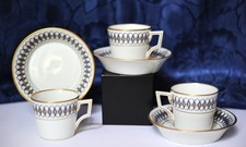 Tre tazzine in porcellana decorate in blu ed oro della Richard-Ginori. 1970-1980