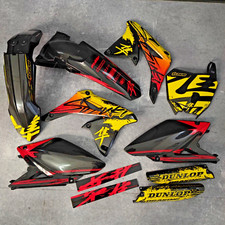 Plastiche + grafica Suzuki RMZ