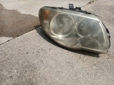 PROIETTORE-FARO DX.        04857830AC CHRYSLER VOYAGER/GRAND VOYAGER (04/04>12/0