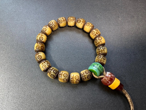 Bracciale mala con - teschio, in