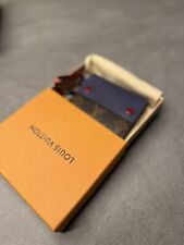 Portafoglio compatto Monogram e Taiga Louis Vuitton Marrone Blu like New