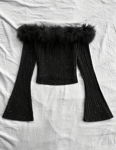 Top nero elegante off shoulder
