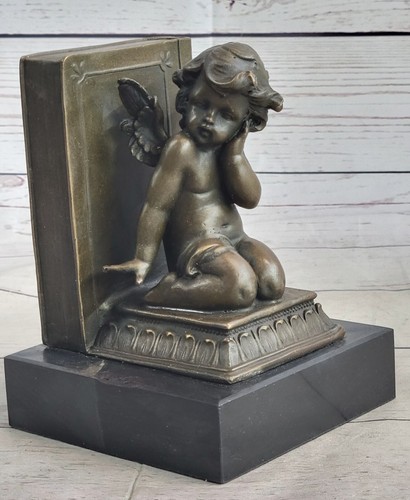 Fermalibri figurativi - figurativi, in