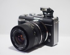 28mm= obiettivo 50mm f.2.8 su