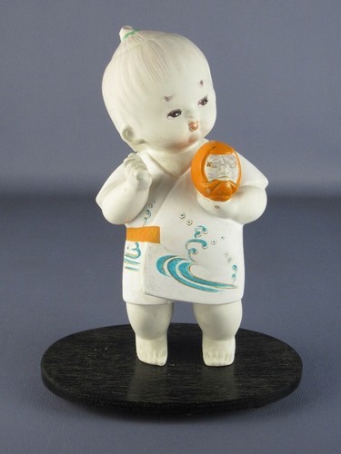 Statua terracotta bambina con