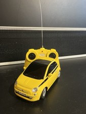 AUTO ELETTRICA FIAT 500 GIALLA RC CON RADIOCOMANDO FUNZIONANTE