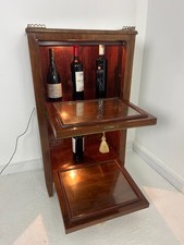 Mobile bar anni '40 con scomparti illuminati