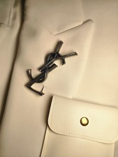 Spilla YSL argento o tono oro