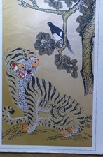 Un dipinto popolare coreano di una tigre e una gazza è stato stampato su seta