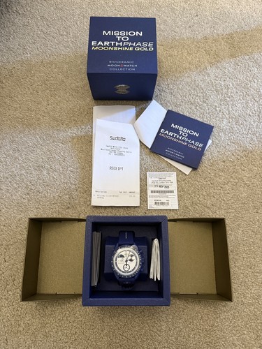 Swatch omega moonwatch - omega,