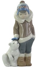 Statuina porcellana Lladro n.5238 "Ragazzo eschimese con cucciolo di orso polare", Juan Huerta