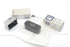 Minolta 16 fotocamera subminiatura, obiettivo 22 mm f/2.8 Rokkor, pellicola sigillata, clip treppiede