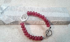 bracciale donna con radice di rubino chiusura e centrale in argento tibetano