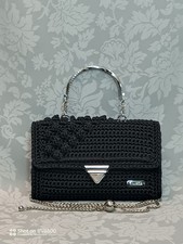 Borse donna lavorate a