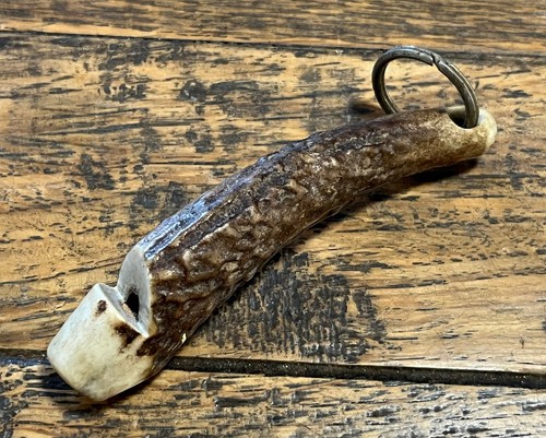Antico fischietto cane pistola