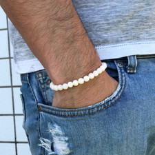 Bracciale con perle bianche - bracciale,