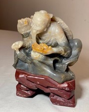 statua scultura uomo pescatore