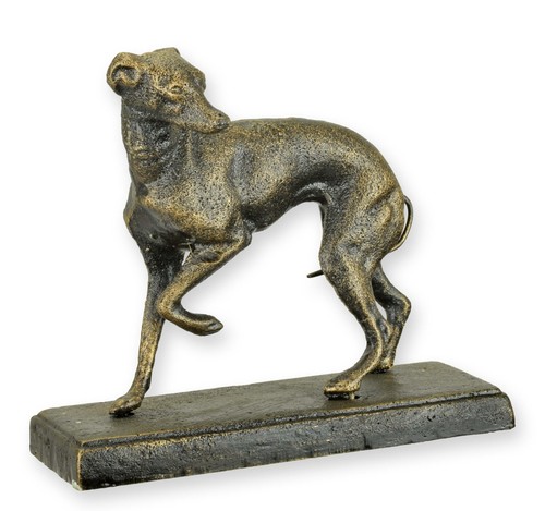 Una statuetta ghisa - una,