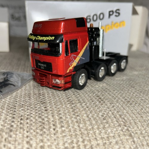 Man trucks pulling champion - man, champion"