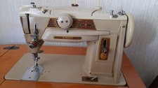 Macchina da cucire SINGER vintage  mod.401 a scomparsa con mobile in radica