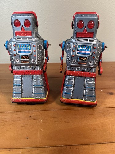 Two 1960s atom robots - two,