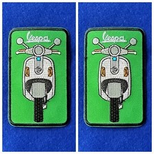 A Pair Of Vespa Scooter