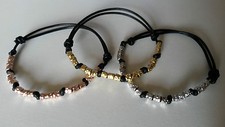 BRACCIALE CON PEPITE GRANELLI