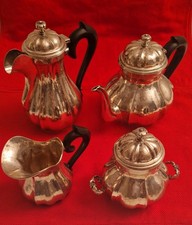 Servizio tè e caffè 4 pezzi in ARGENTO 800 battuto a mano 