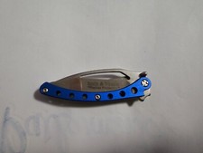 coltello usato smith e wesson usato tenuto bene ,alluminio anodizzato blu 