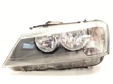 7217287 FRONT LEFT HEADLIGHT /