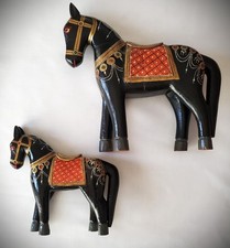 Cavalli vintage in legno nero