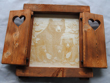 Finestra in legno con scuri