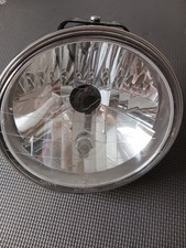 Faro proiettore e culla per