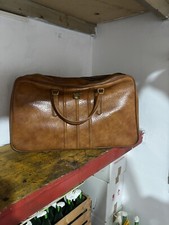 Valigia e Borsone in pelle