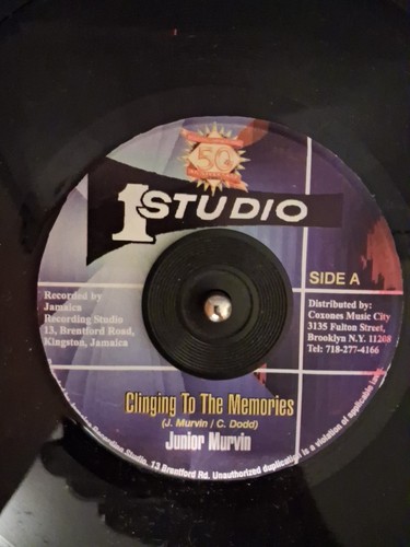 Junior murvin clinging the - murvin,