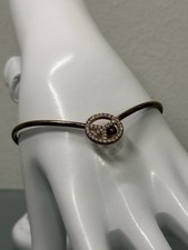 Bracciale con ciondolo segno