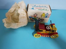 CAR WIND UP TIN LITHO TOYS