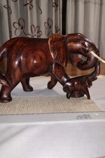 Scultura elefanti in legno
