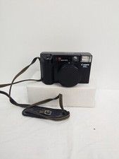 Fotocamera Canon ML AF 35 ML con copriobiettivo non funzionante solo parti