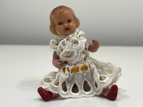Bambola plastica 5 cm - di,