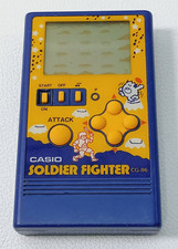 Sistema di gioco LCD portatile vintage CASIO SOLDATINO FIGHTER CG-86 - solo per parti di ricambio