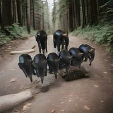 LOTTO FAMIGLIA DI 8 ELEFANTI IN LEGNO ARTIGIANALI SC5