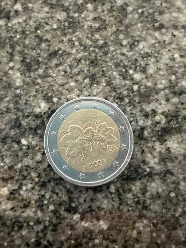Moneta euro con fiori - 2,