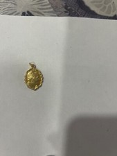 medaglietta del papa color oro Giovanni Paolo II 