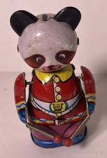 Giocattolo meccanico in latta