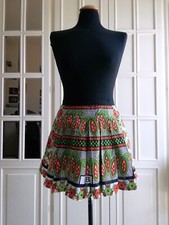 Minigonna a pieghe africana