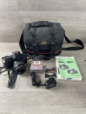 Canon EOS Rebel X S 35 mm ~