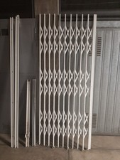 Grata per porta a soffietto  in ferro zincato colore bianco 